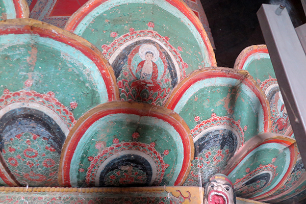 30 The small Buddha image painted on the lotus petal, detail of the throne of the Śākyamuni Buddha on the first level of the Timber Pagoda. Photo by author