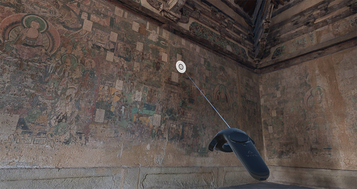 Alt-text: Two richly painted walls with a laser controller Alt-text: Two richly painted walls with a laser controller