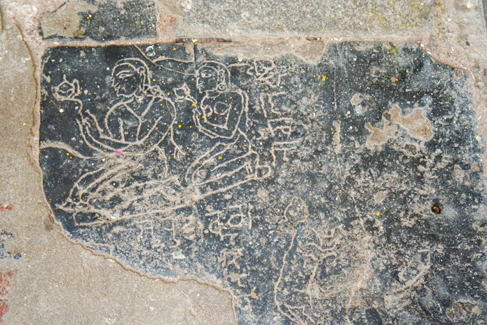 Alt-text: Slab with carved figures