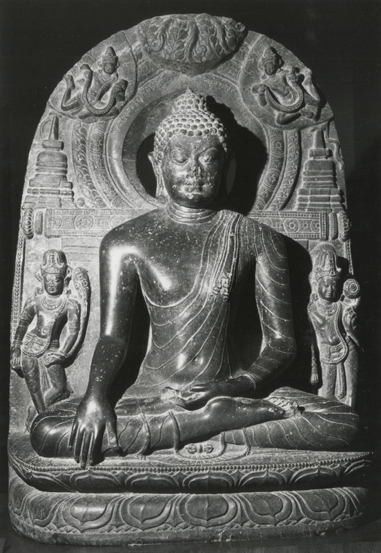 Alt-text: Buddha sculpture