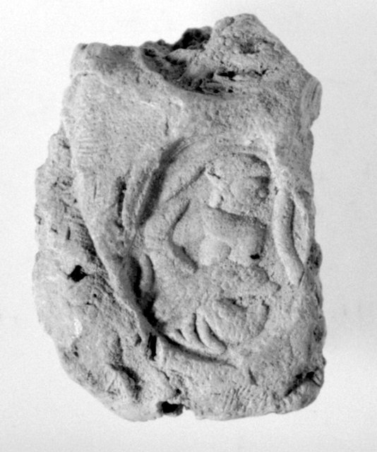 Fig. 2. Kelsey Museum 24431.: Anonymous. Egypt, Karanis. Bulla with one complete impression, one partial impression, second to third centuries CE. Clay, sealing 3.0 × 2.2 cm, impression 1.6 × 1.3 cm. Kelsey Museum 24431; excavation number 30-C123CCH1-E
Fig. 2. Kelsey Museum 24431.: Anonymous. Egypt, Karanis. Bulla with one complete impression, one partial impression, second to third centuries CE. Clay, sealing 3.0 × 2.2 cm, impression 1.6 × 1.3 cm. Kelsey Museum 24431; excavation number 30-C123CCH1-E