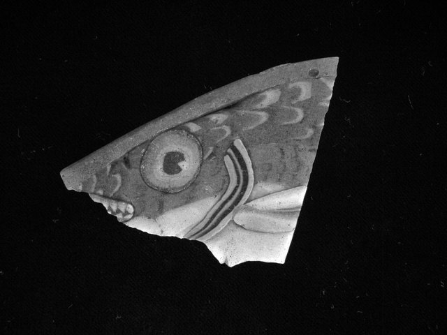 Egypt, first century BCE to first century CE.
Mosaic glass inlay depicting the head of a fish.
Glass inlay, L. 5.5 cm.
Ruthven Collection, Kelsey Museum 1965.3.135 Egypt, first century BCE to first century CE.
Mosaic glass inlay depicting the head of a fish.
Glass inlay, L. 5.5 cm.
Ruthven Collection, Kelsey Museum 1965.3.135