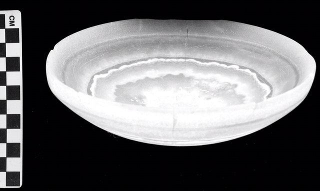 Fig. 6. Side view of calcite bowl, ca. 3100-2900 BCE (First Dynasty), from Lahun, Egypt, Diam. 15.8 cm, H. 5 cm. William Flinders Petrie Donation, 1921, KM 1913. Fig. 6. Side view of calcite bowl, ca. 3100-2900 BCE (First Dynasty), from Lahun, Egypt, Diam. 15.8 cm, H. 5 cm. William Flinders Petrie Donation, 1921, KM 1913.