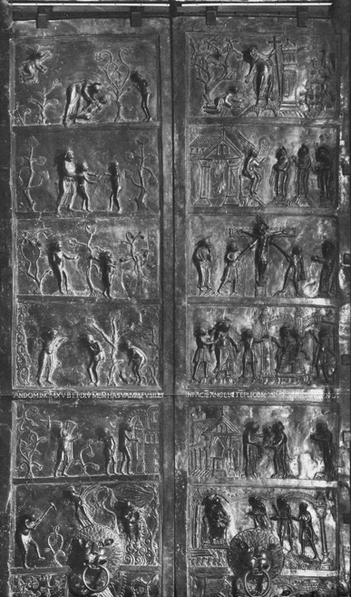 Illustration 1: Bronze doors from St. Mary’s Cathedral, Hildesheim (c.1015), showing the Creation of Adam and Eve and the Expulsion from the Garden of Eden (left), birth and Passion of Christ (right); vertical reading orders: left top-down; right down-top. Illustration 1: Bronze doors from St. Mary’s Cathedral, Hildesheim (c.1015), showing the Creation of Adam and Eve and the Expulsion from the Garden of Eden (left), birth and Passion of Christ (right); vertical reading orders: left top-down; right down-top.