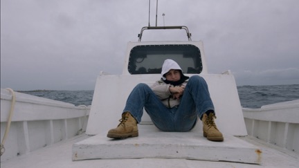 Fig. 1: Cheeky Samuele serves as guide to life on Lampedusa where human tragedies occur almost every day. Fig. 1: Cheeky Samuele serves as guide to life on Lampedusa where human tragedies occur almost every day.