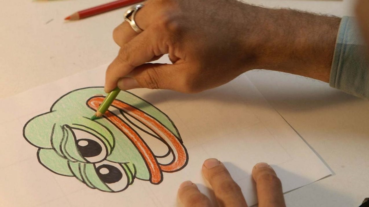 Figure 1: Drawing Pepe the Frog in Arthur Jones’s Feels Good Man (2020). Produced by Museum & Crane, Wavelength Productions, and XTR. Figure 1: Drawing Pepe the Frog in Arthur Jones’s Feels Good Man (2020). Produced by Museum & Crane, Wavelength Productions, and XTR.