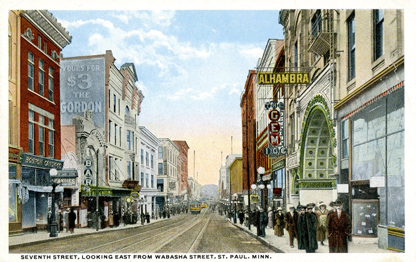 East 7th Street, looking east from Wabasha Street North. The Alhambra Theatre, located at 14 East 7 Street, can be seen on the right. The theater, which entertained up to 425 patrons per show, operated from 1911 to 1930. During the epidemic, public health officials closed the Alhambra and all other theaters and public entertainment venues in the city.