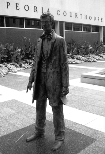 Figure 1. Lincoln Draws the Line, by John McClarey, near the site of his Peoria speech. Photo by the author. Figure 1. Lincoln Draws the Line, by John McClarey, near the site of his Peoria speech. Photo by the author.