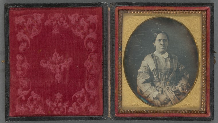 Portrait of a woman wearing a plaid dress with lace collar. C. Evans, photographer. Schomburg Center for Research in Black Culture, Photographs and Prints Division. Portrait of a woman wearing a plaid dress with lace collar. C. Evans, photographer. Schomburg Center for Research in Black Culture, Photographs and Prints Division.