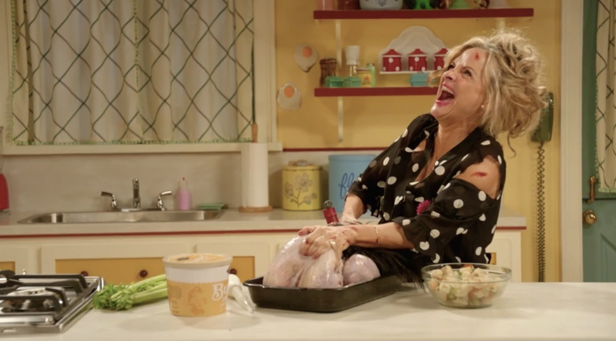 Figure 3. Amy Sedaris stuffs a turkey with a possessed Christmas nutcracker in At Home with Amy Sedaris (season 1, episode 7, “Holidays,” aired November 28, 2017, on truTV). Figure 3. Amy Sedaris stuffs a turkey with a possessed Christmas nutcracker in At Home with Amy Sedaris (season 1, episode 7, “Holidays,” aired November 28, 2017, on truTV).