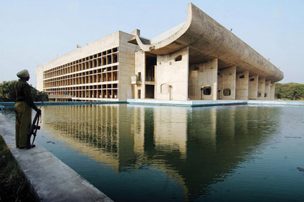 In this picture taken November 19, 2007, an Indian guard stands beside the Assembly Building of Chandigarh designed and built by Le Corbusier. NARINDER NANU/AFP/Getty Images In this picture taken November 19, 2007, an Indian guard stands beside the Assembly Building of Chandigarh designed and built by Le Corbusier. NARINDER NANU/AFP/Getty Images