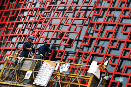 Chinese construction workers labor to build a shopping center in Beijing in June 2008. China’s retail sales went up by 21.6 percent in May from a year ago to 870.4 billion yuan (126.1 billion dollars), the government said June 13, 2008. Retail sales are the main gauge for consumer spending in the world’s fourth-largest economy. TEH ENG KOON/AFP/Getty Images Chinese construction workers labor to build a shopping center in Beijing in June 2008. China’s retail sales went up by 21.6 percent in May from a year ago to 870.4 billion yuan (126.1 billion dollars), the government said June 13, 2008. Retail sales are the main gauge for consumer spending in the world’s fourth-largest economy. TEH ENG KOON/AFP/Getty Images