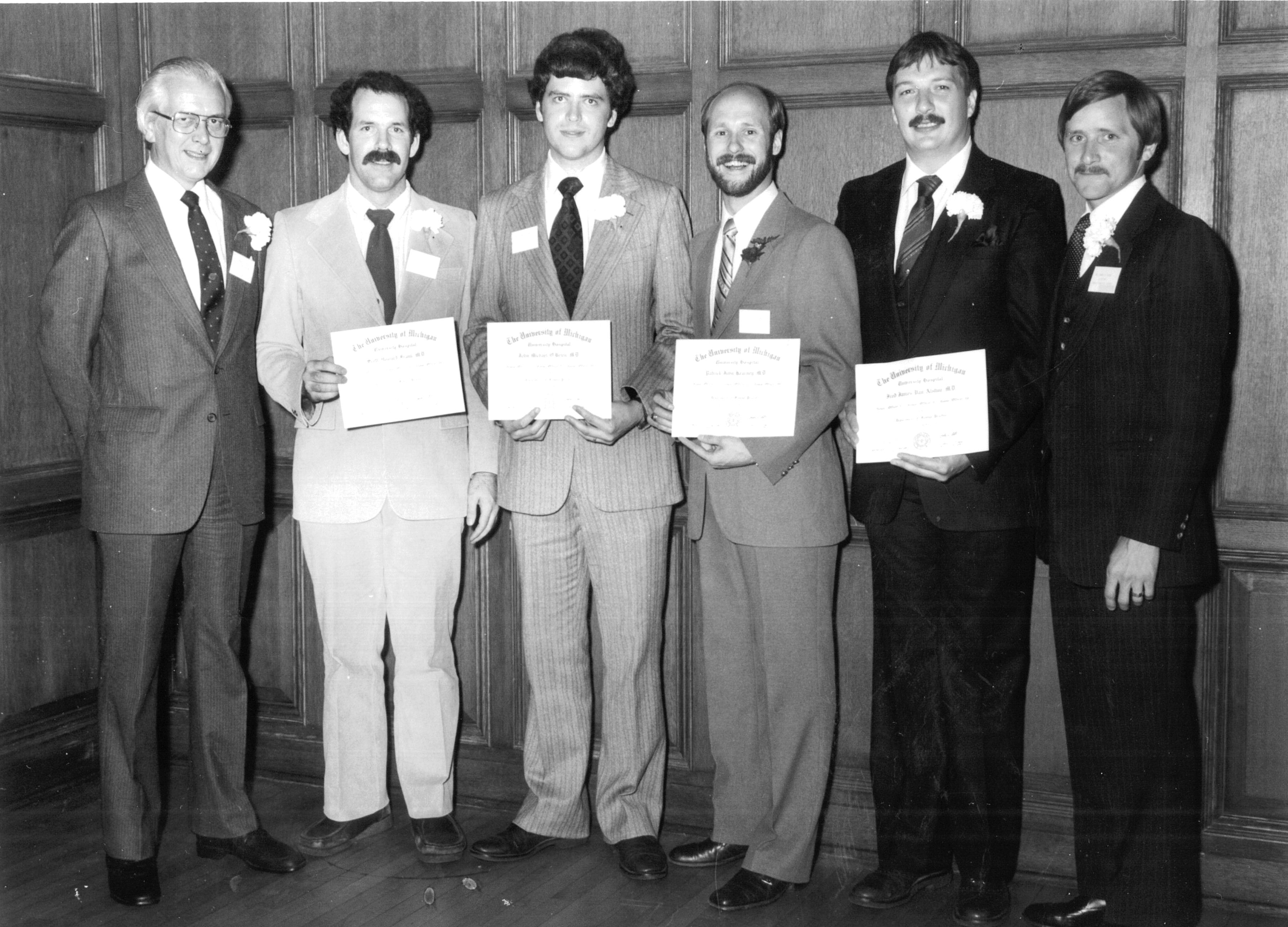 Figure 7.1.: Graduation ceremony for the first class of residents in 1982. From left to right: Dr. Davies, Dr. Frank, Dr. O’Brien, Dr. Kearney, Dr. Van Alstine, and Dr. Peggs Figure 7.1.: Graduation ceremony for the first class of residents in 1982. From left to right: Dr. Davies, Dr. Frank, Dr. O’Brien, Dr. Kearney, Dr. Van Alstine, and Dr. Peggs