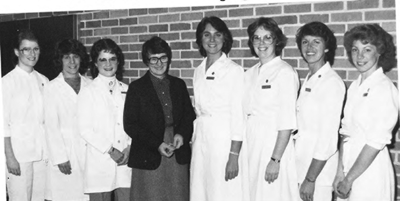1984 dental hygiene faculty: (L–R) Jennifer Turnbull, Wendy Kerschbaum, Debra Zahn-Simmons, Sally Holden, Tamara Bloch, Bridget Clancy, Susan Pritzel, and Susan Johnstal. From 1984 School of Dentistry Student Yearbook. 1984 dental hygiene faculty: (L–R) Jennifer Turnbull, Wendy Kerschbaum, Debra Zahn-Simmons, Sally Holden, Tamara Bloch, Bridget Clancy, Susan Pritzel, and Susan Johnstal. From 1984 School of Dentistry Student Yearbook.