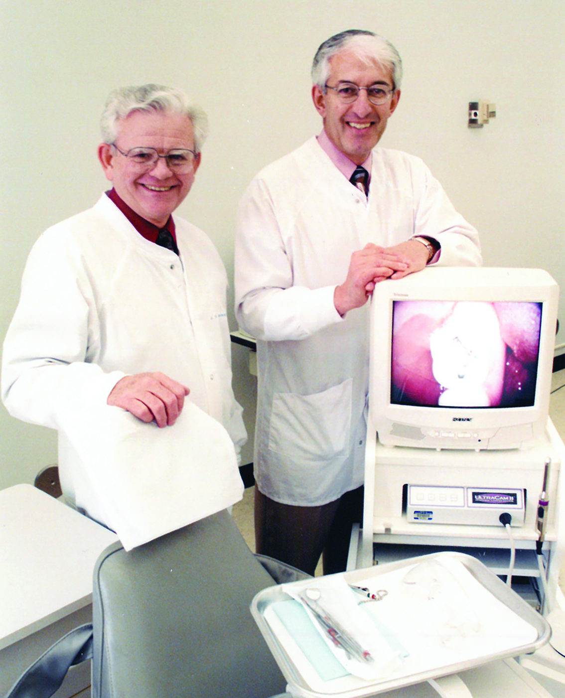 Drs. Joseph Dennison and Peter Yaman demonstrate the Veravision UltraCam II Intraoral Camera System. Drs. Joseph Dennison and Peter Yaman demonstrate the Veravision UltraCam II Intraoral Camera System.
