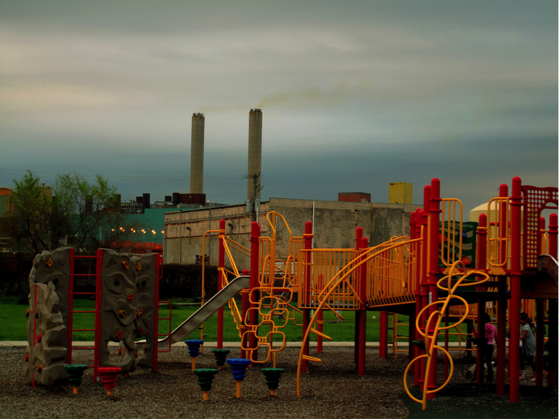 Figure 1: The Detroit Wastewater Treatment Plant forms the backdrop to the Delray Neighborhood House playground. Figure 1: The Detroit Wastewater Treatment Plant forms the backdrop to the Delray Neighborhood House playground.