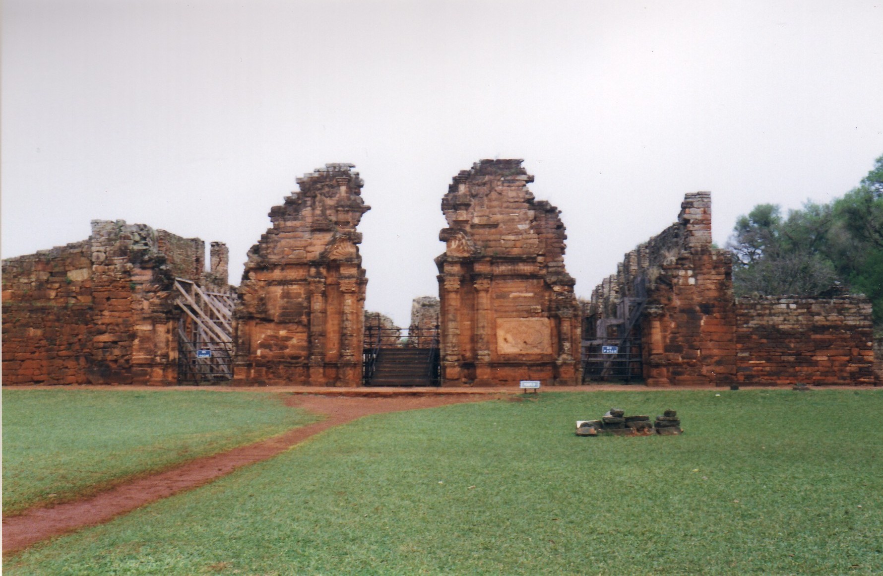 Figure 3. Village of San Ignacio Miní, view of the entrance of the church from the plaza, Misiones, Argentina (author’s photo). Figure 3. Village of San Ignacio Miní, view of the entrance of the church from the plaza, Misiones, Argentina (author’s photo).