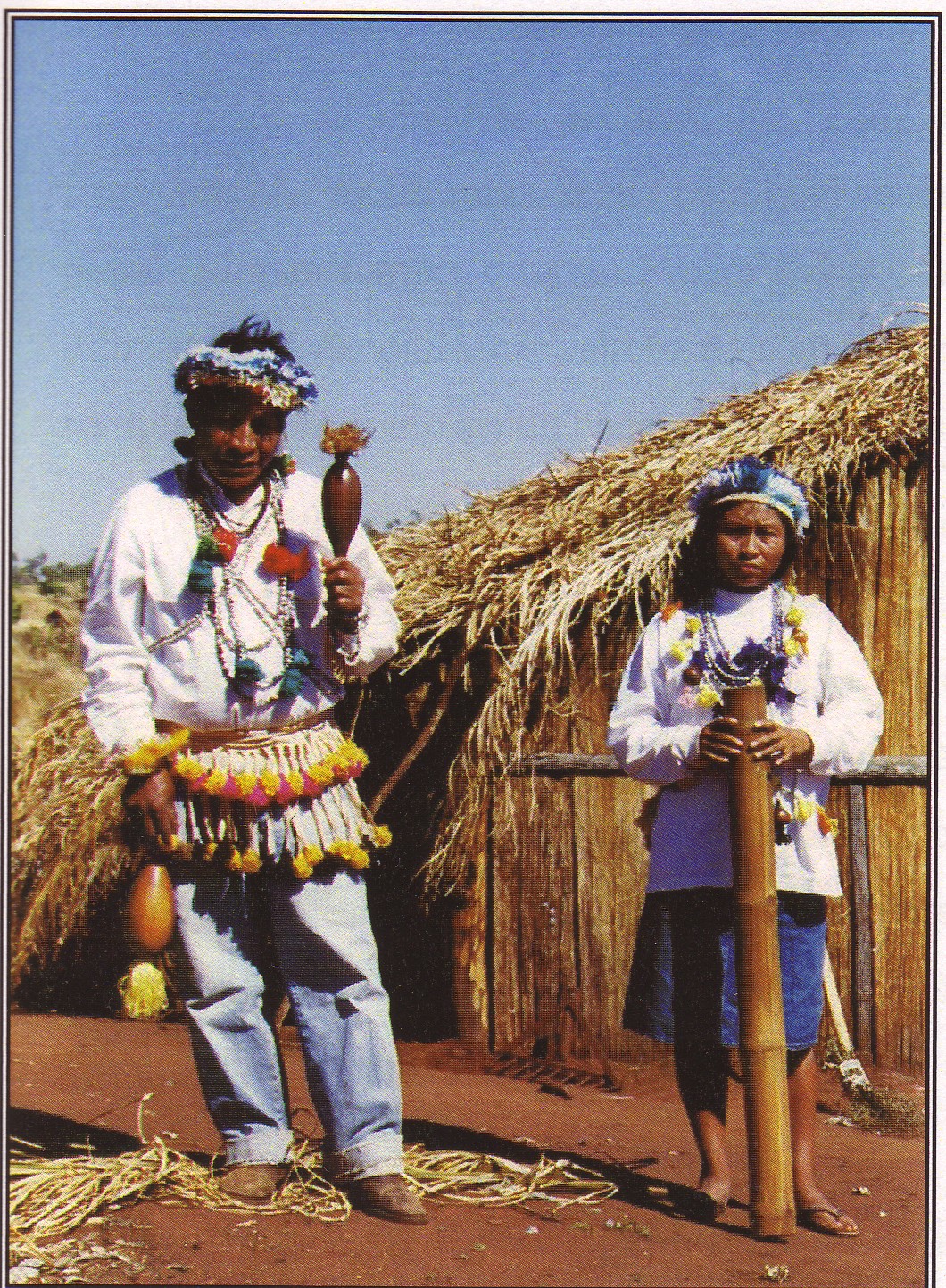 Figure 12. Atanás Teixera and his wife Roberta with maraca y takuá, Ñande ru Marangatú, Brazil, 2000. Picture from: Mura, Fabio: A Procura do “Bom viver”. Territorio, tradiçao de conhecimento e ecologia doméstica entre os Kaiowa. Doctoral dissertation, Graduate Program of Social Anhtropology, Museo Nacional, Federal University of Rio de Janeiro. Figure 12. Atanás Teixera and his wife Roberta with maraca y takuá, Ñande ru Marangatú, Brazil, 2000. Picture from: Mura, Fabio: A Procura do “Bom viver”. Territorio, tradiçao de conhecimento e ecologia doméstica entre os Kaiowa. Doctoral dissertation, Graduate Program of Social Anhtropology, Museo Nacional, Federal University of Rio de Janeiro.