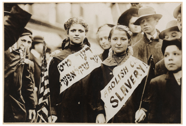 Image 2: International Worker’s Day parade, May 1, 1909, New York City. “Abolish Child Labor!” Yiddish and English. Courtesy Library of Congress.