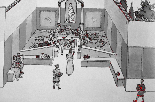 Figure 2. Reconstruction of a Roman dining party. Note the triclinium (the three-couch) layout of the party. Figure 2. Reconstruction of a Roman dining party. Note the triclinium (the three-couch) layout of the party.