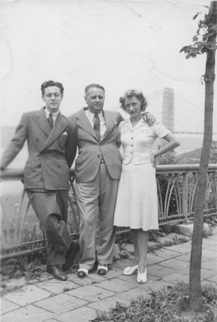 From H. P. (Pierre) Secher's album of photographs. Pierre with his parents and with the George Washington Bridge behind them. From H. P. (Pierre) Secher's album of photographs. Pierre with his parents and with the George Washington Bridge behind them.