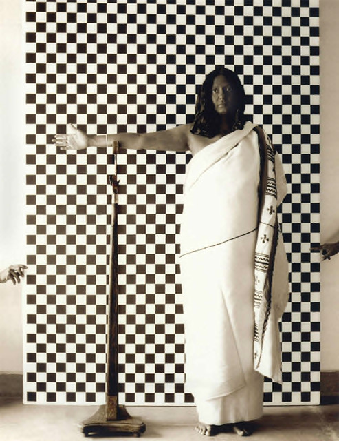 Pushpamala N., ‘Toda (after late 19th century British anthropometric photograph)’. From the photo-performance project Native Women of South India: Manners and Customs, 2000-2004. Sepia toned silver gelatin print on fibre paper, 20 x 24 inches. Courtesy the artist and Bose Pacia, New York. Pushpamala N., ‘Toda (after late 19th century British anthropometric photograph)’. From the photo-performance project Native Women of South India: Manners and Customs, 2000-2004. Sepia toned silver gelatin print on fibre paper, 20 x 24 inches. Courtesy the artist and Bose Pacia, New York.