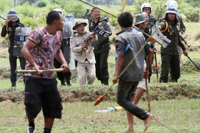 Sovan Philong, ‘Violent Scenes in a Rice Paddy 06’, 2009. Digital C-Print. Courtesy the artist and Asia Motion. Sovan Philong, ‘Violent Scenes in a Rice Paddy 06’, 2009. Digital C-Print. Courtesy the artist and Asia Motion.