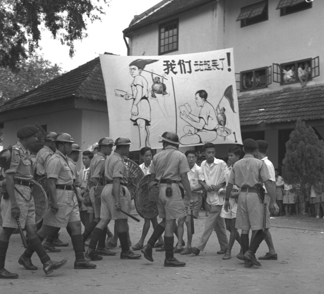 Fig. 6. Police and students at Chung Cheng High School during the student riots in 1956. (Singapore Press Holdings, courtesy of National Archives of Singapore) Fig. 6. Police and students at Chung Cheng High School during the student riots in 1956. (Singapore Press Holdings, courtesy of National Archives of Singapore)