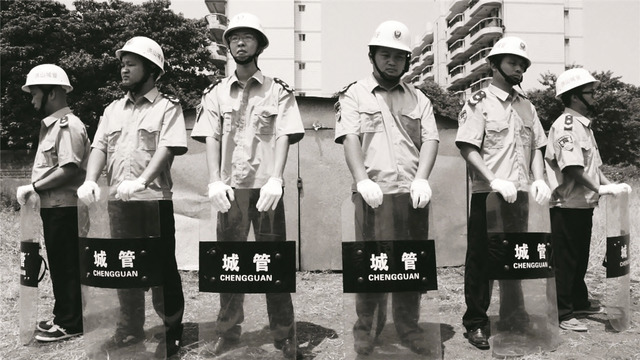 Li Yu and Liu Bo, Civilized Administrative Enforcement Caught a Citizen Who didn't Want to Move Home, Inkjet Print, 2006-2010. Li Yu and Liu Bo, Civilized Administrative Enforcement Caught a Citizen Who didn't Want to Move Home, Inkjet Print, 2006-2010.