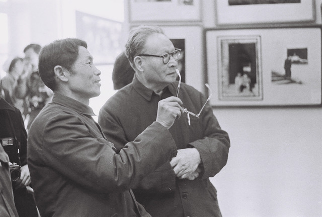 Fig. 30. Li Xiaobin, Yuan Yiping (left), then vice chairman of the Chinese Photography Association, and Wu Yinxian (right), a noted photographer and at the time vice chairman of the Chinese Photography Association, at the first Nature, Society, and Man exhibition, 1979. Courtesy of Li Xiaobin.