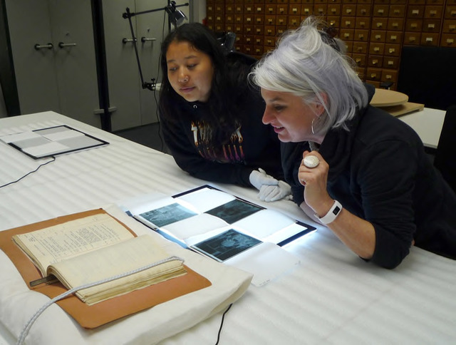 Fig. 9. Nyema Droma and Clare Harris viewing glass plates and documentation in the Pitt Rivers Museum archive, 2018. Photograph: Philip Grover, © Pitt Rivers Museum, University of Oxford. Fig. 9. Nyema Droma and Clare Harris viewing glass plates and documentation in the Pitt Rivers Museum archive, 2018. Photograph: Philip Grover, © Pitt Rivers Museum, University of Oxford.