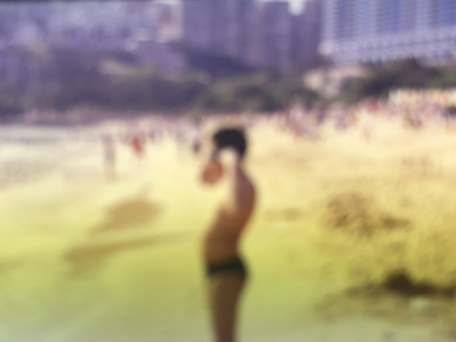 Fig. 1. Wei Leng Tay, A boy at Repulse Bay beach during SARS, 2003. Kodak E100VS slide, 35mm, 2019. Archival pigment print, 75x100cm (29.53x39.37 inches), edition of 5, © Wei Leng Tay, courtesy the artist. Fig. 1. Wei Leng Tay, A boy at Repulse Bay beach during SARS, 2003. Kodak E100VS slide, 35mm, 2019. Archival pigment print, 75x100cm (29.53x39.37 inches), edition of 5, © Wei Leng Tay, courtesy the artist.