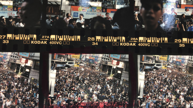 Fig. 2. Wei Leng Tay, Article 23 protest, Causeway Bay, 1/7/2003. Contact sheet, Kodak 400VC negative, 35mm, 2019. Archival pigment print, 28.125x50cm, edition of 5, © Wei Leng Tay, courtesy the artist. Fig. 2. Wei Leng Tay, Article 23 protest, Causeway Bay, 1/7/2003. Contact sheet, Kodak 400VC negative, 35mm, 2019. Archival pigment print, 28.125x50cm, edition of 5, © Wei Leng Tay, courtesy the artist.