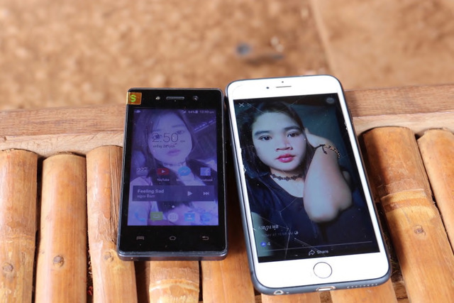 Fig. 10. An indigenous woman’s portrait on her Chinese-made smartphone camera, and her Facebook profile viewed on apple IPhone, November 2018. Remote and poor communities now have access to photography and the digital platforms through which they can be distributed at a very affordable price. Photograph by Sokphea Young. Fig. 10. An indigenous woman’s portrait on her Chinese-made smartphone camera, and her Facebook profile viewed on apple IPhone, November 2018. Remote and poor communities now have access to photography and the digital platforms through which they can be distributed at a very affordable price. Photograph by Sokphea Young.