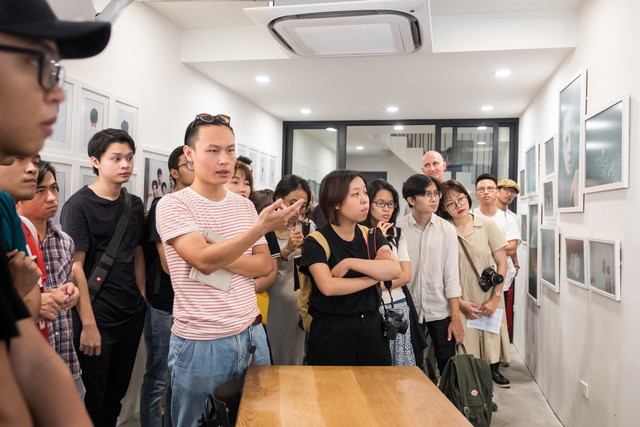 Fig. 3. Art tour of We Will Have Been Young exhibition led by Linh Pham at Matca Space for Photography, Hanoi, Vietnam, October 13, 2019, photo courtesy of Matca. Fig. 3. Art tour of We Will Have Been Young exhibition led by Linh Pham at Matca Space for Photography, Hanoi, Vietnam, October 13, 2019, photo courtesy of Matca.
