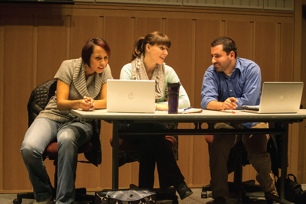 Figure 2. Three Graduate Students Discuss the Treatment of Women at a Recent STEM Conference. From Left, Helki Jackson as Kiana, Rochelle Clark as Courtney, and Matios Simonian as Joel. (Photo taken by Pamela Fisher and reprinted with permission.) Figure 2. Three Graduate Students Discuss the Treatment of Women at a Recent STEM Conference. From Left, Helki Jackson as Kiana, Rochelle Clark as Courtney, and Matios Simonian as Joel. (Photo taken by Pamela Fisher and reprinted with permission.)