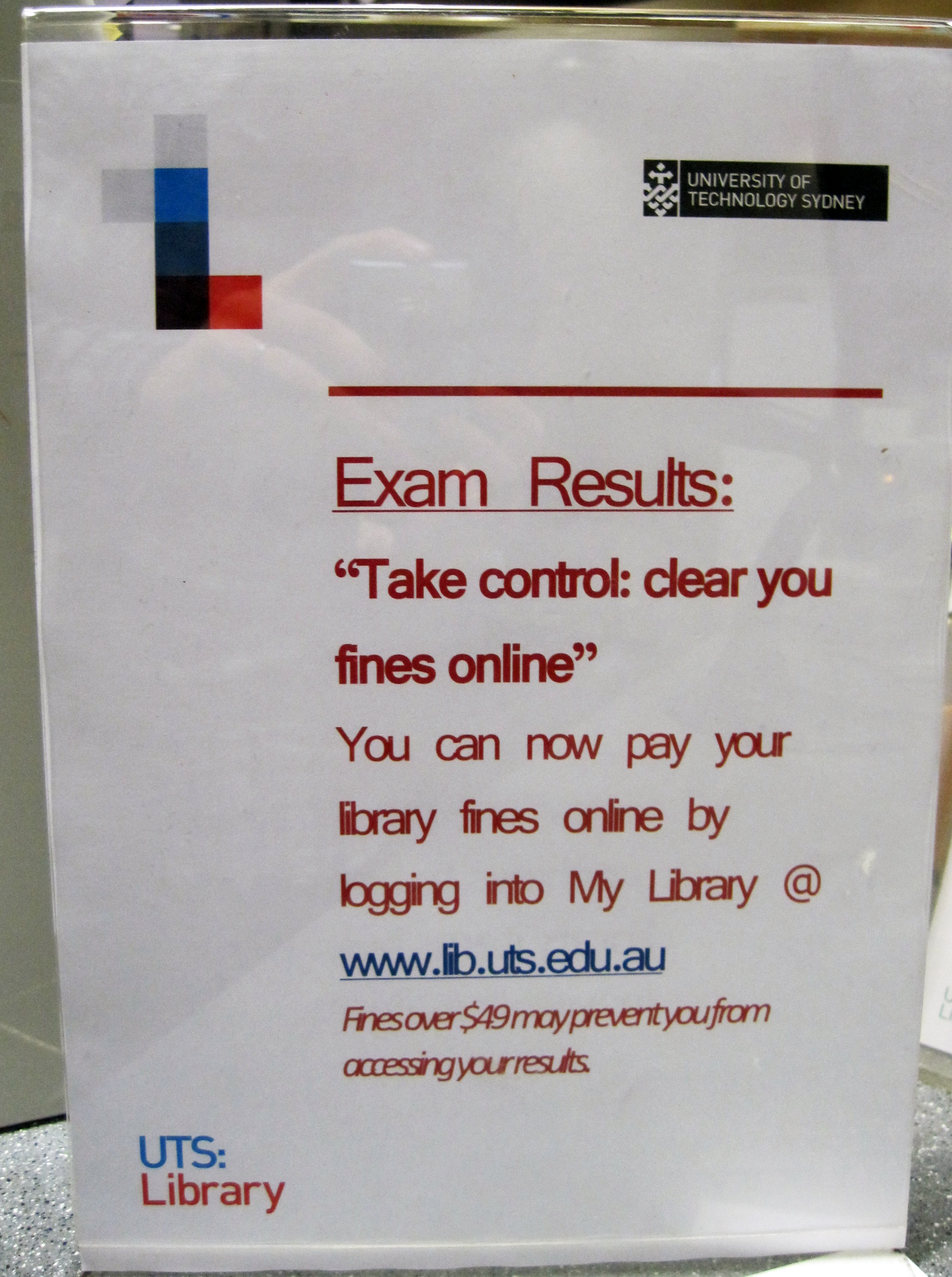 Figure 4. While this sign uses the library colors and some brand elements, the information is poorly conveyed with a poor choice of typeface. Figure 4. While this sign uses the library colors and some brand elements, the information is poorly conveyed with a poor choice of typeface.